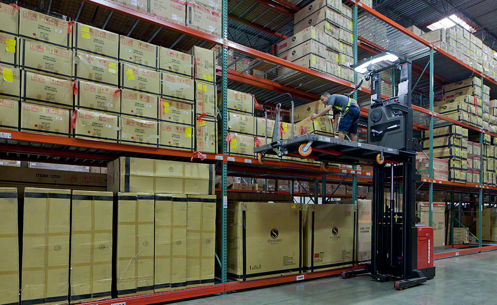 Wire-guided forklifts can run along the narrow aisles