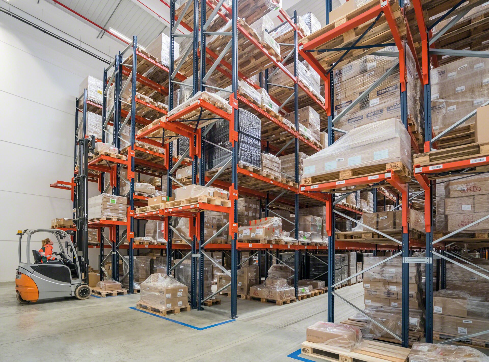 Pick and deposit (P&D) stations, located on the ends of the racking units, streamline the flow of goods